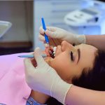 dentist providing cosmetic dentistry service
